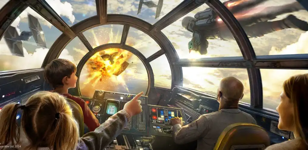 Guests piloting the Millennium Falcon cockpit as a TIE fighter and explosion fill the viewport