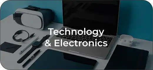 A desk with a virtual reality headset, laptop, headphones, and various electronic accessories on a blue background with white text reading technology and electronics.