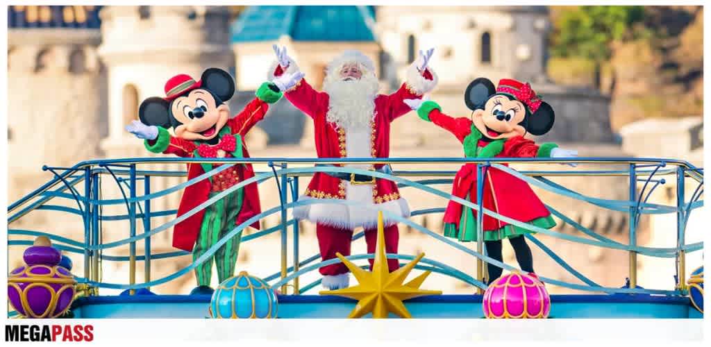Santa Claus and Mickey Mouse and Minnie Mouse in holiday costumes on a decorated float celebrating Christmas