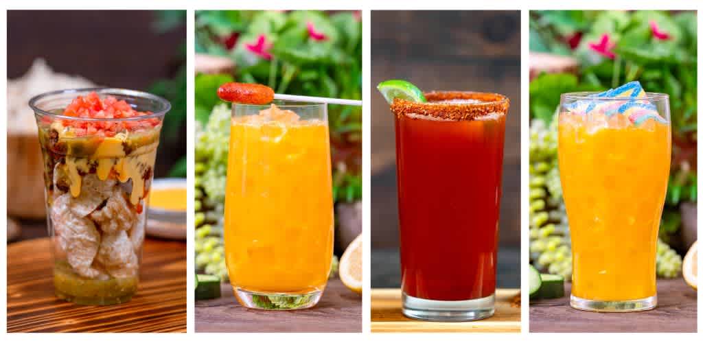 Four colorful cocktails in different glasses with fruit garnishes arranged side by side on a wooden surface.