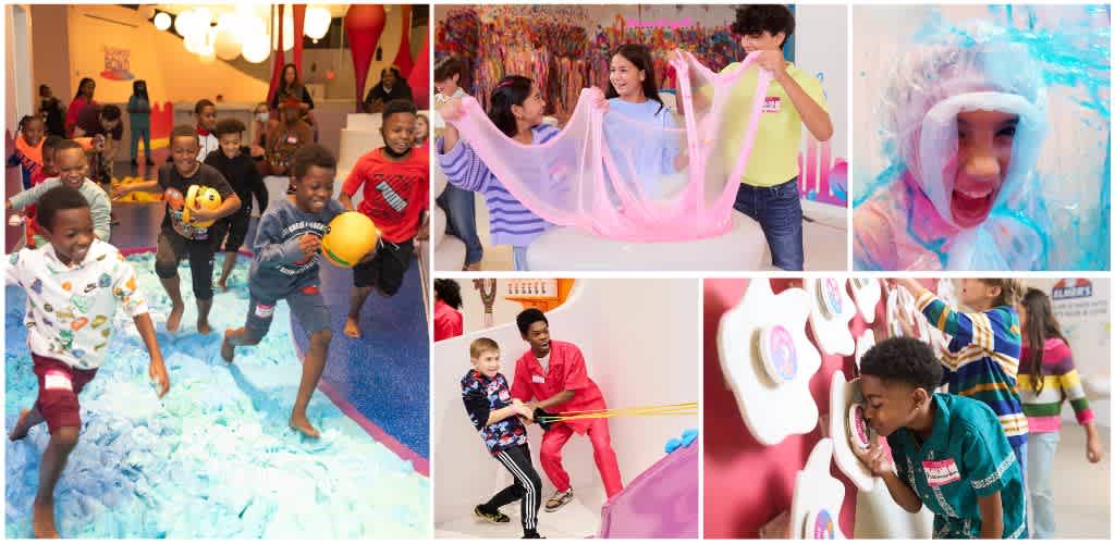 Children enjoying active play and interactive activities at an indoor fun center with bright colors and energetic atmosphere