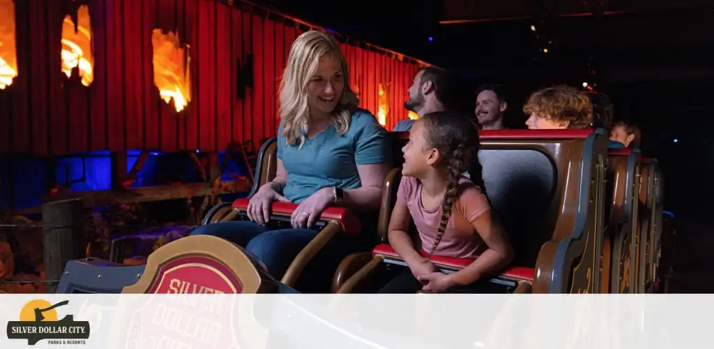 People enjoying a roller coaster ride at Silver Dollar City amusement park.