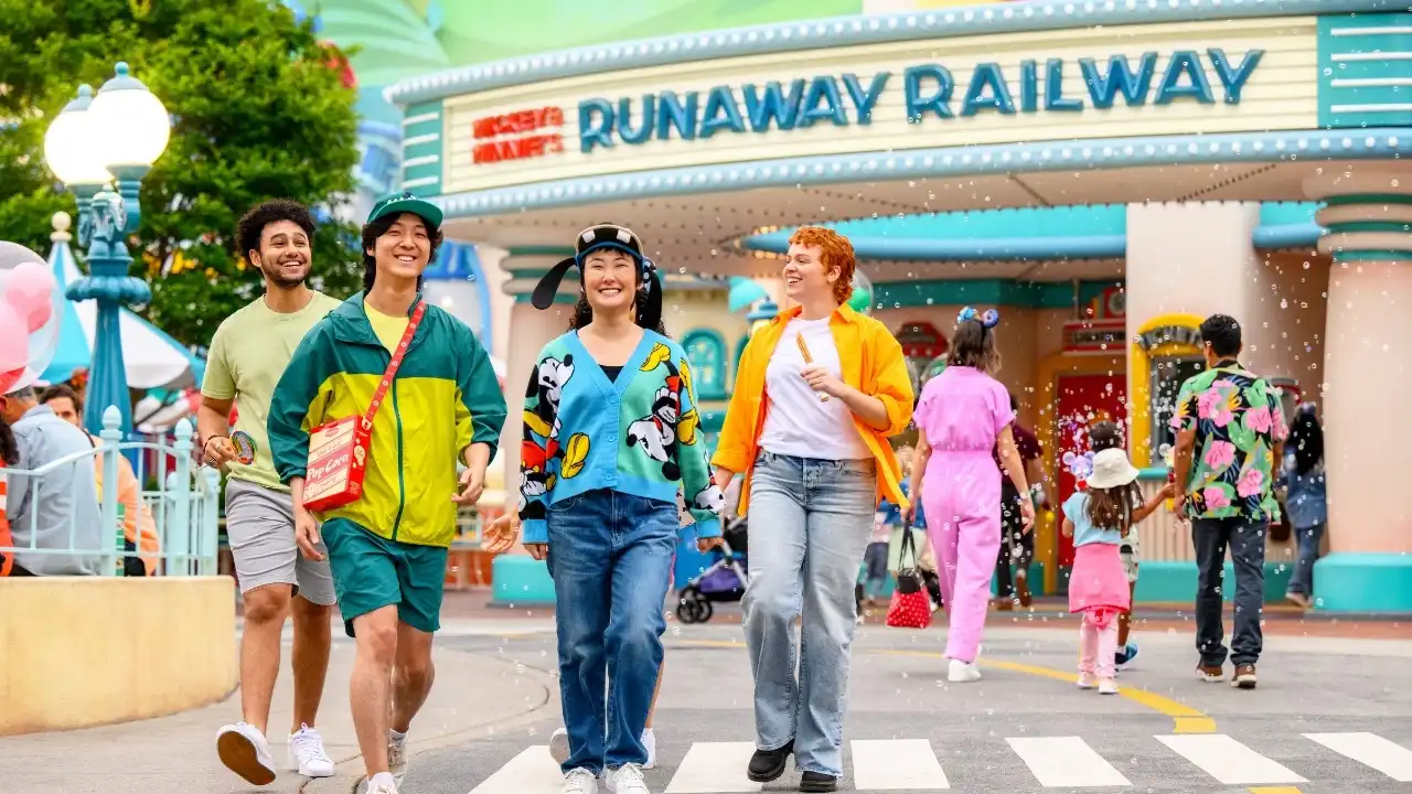 Family walking with luggage ready for a Disneyland Adventure trip