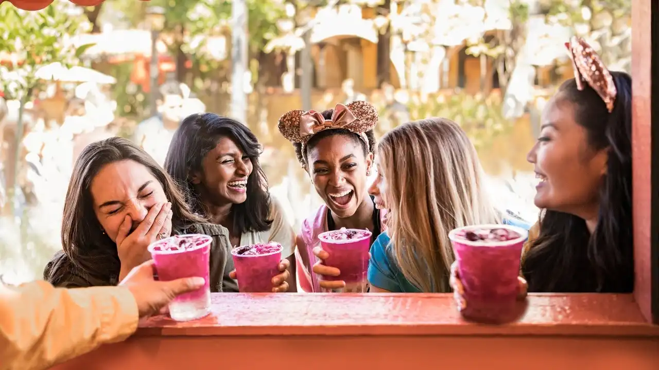 Family enjoying food together at Disney California Adventure Food and Wine Festival